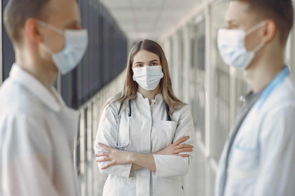 Image of a pregnant woman receiving support from a healthcare professional.